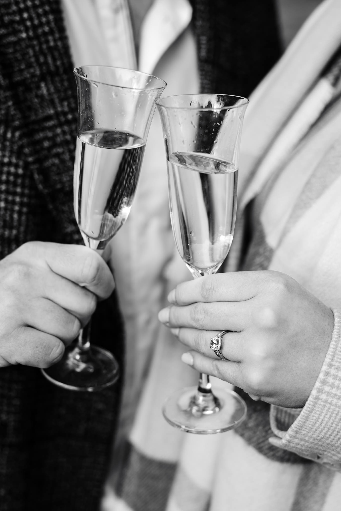 black and white cloose up of champagne during an engagement photography session in basingstoke