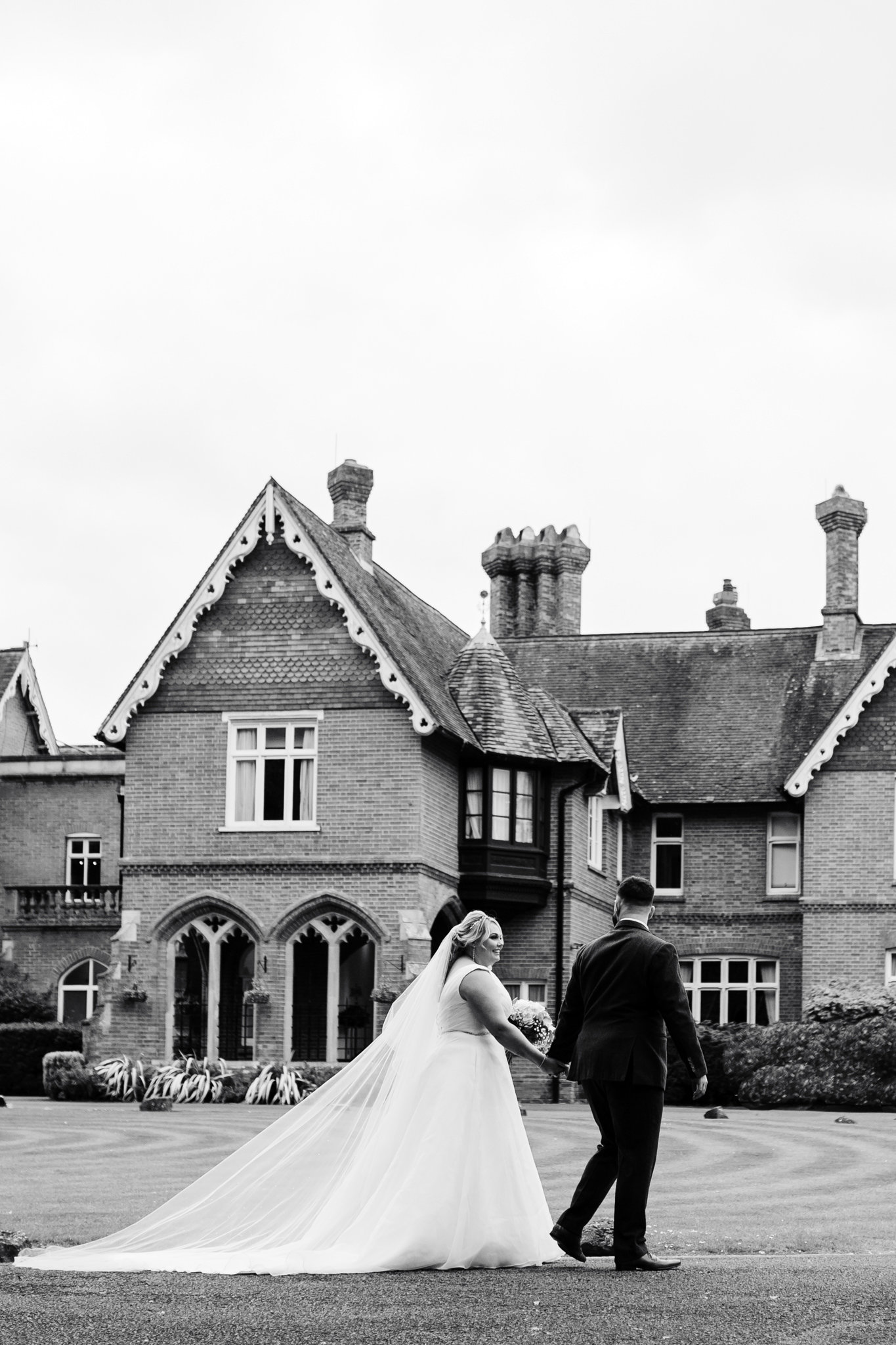 timeless wedding portrait of a bride and groom at audleys wood